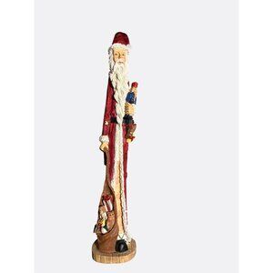 Hand-Painted Thin Santa Figurine With Nutcracker and Gifts